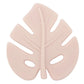 A silicone teether in the shape of a leaf, primarily in cream color.