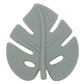 A silicone teether in the shape of a leaf, primarily in light green color.